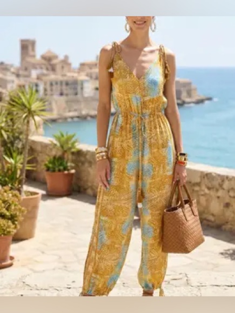 Sleeveless V-Neck Tie-Shoulder Floral Jumpsuit in Yellow